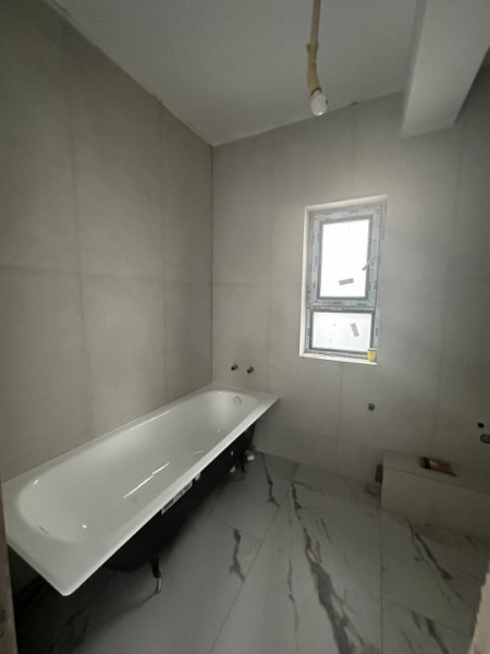 Vanzare Apartament 2 camere+curte 60mp si 2 locuri de parcare